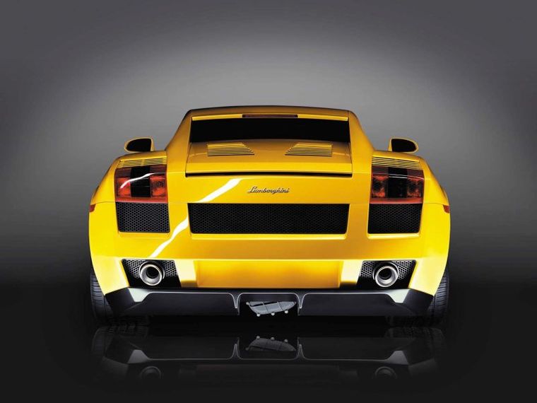 Yellow Lamborghini rear view.